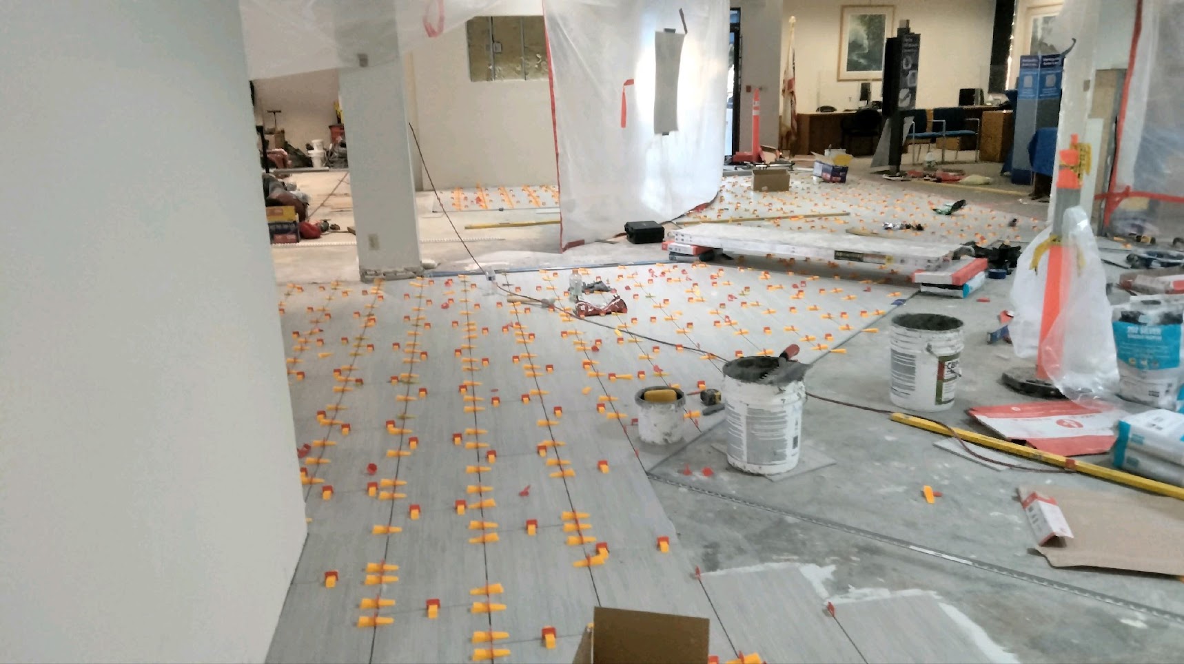 Tile being laid